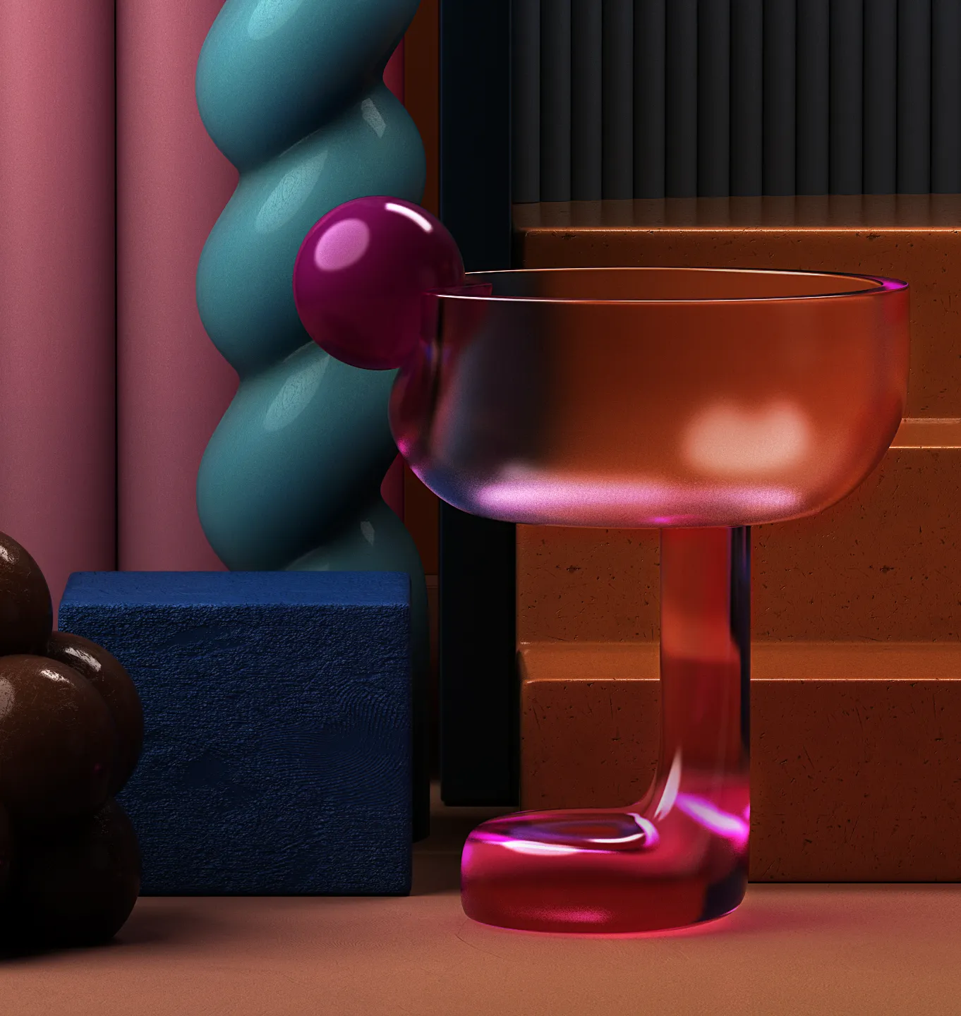 Styling_Stills03 Close-up of a translucent pink glass, a blue spiral candle and geometric objects with contrasting textures.
