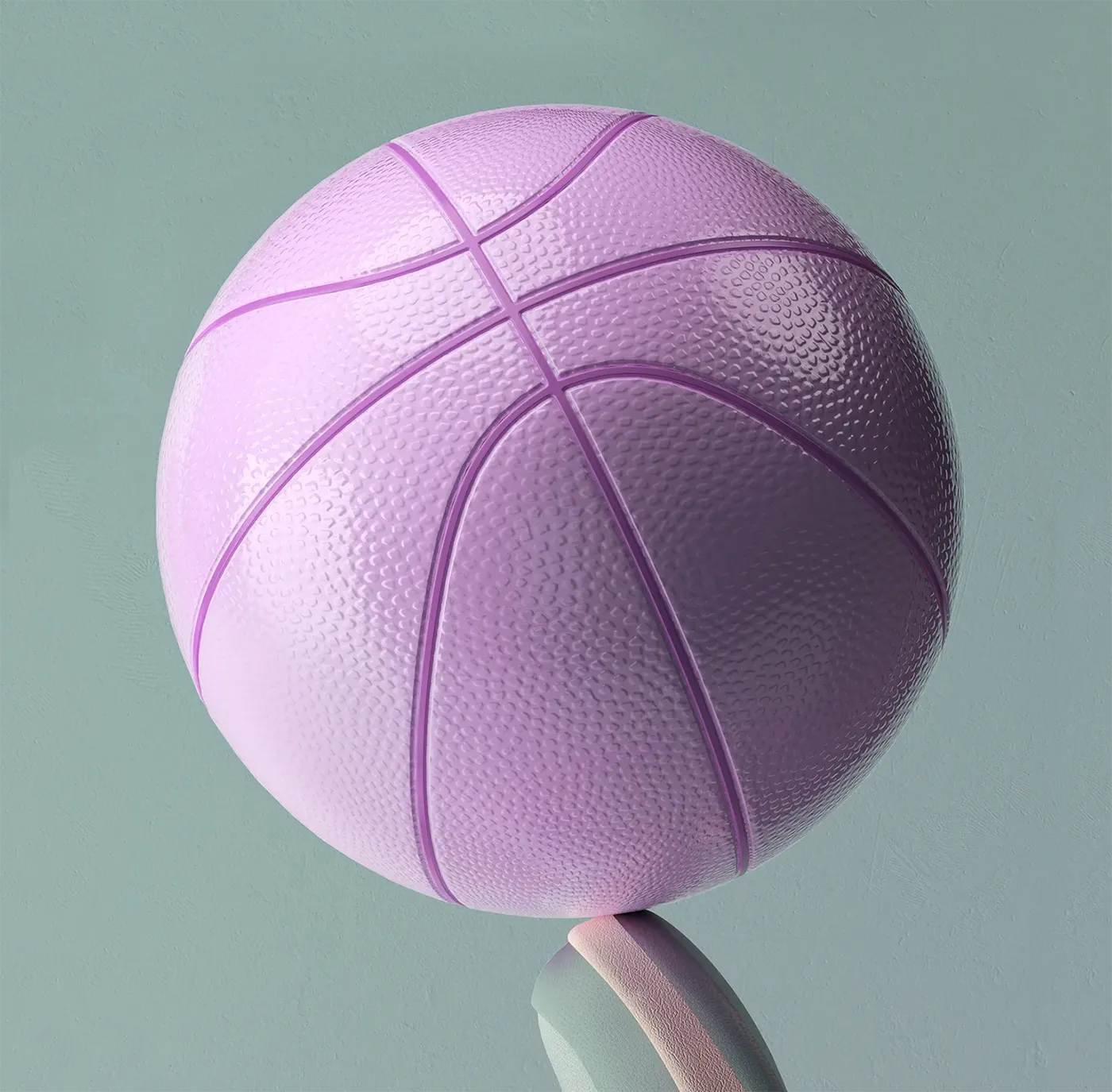 Styling_Stills11 Close-up of a textured lavender basketball balanced on the tip of a pastel green and pink sneaker.