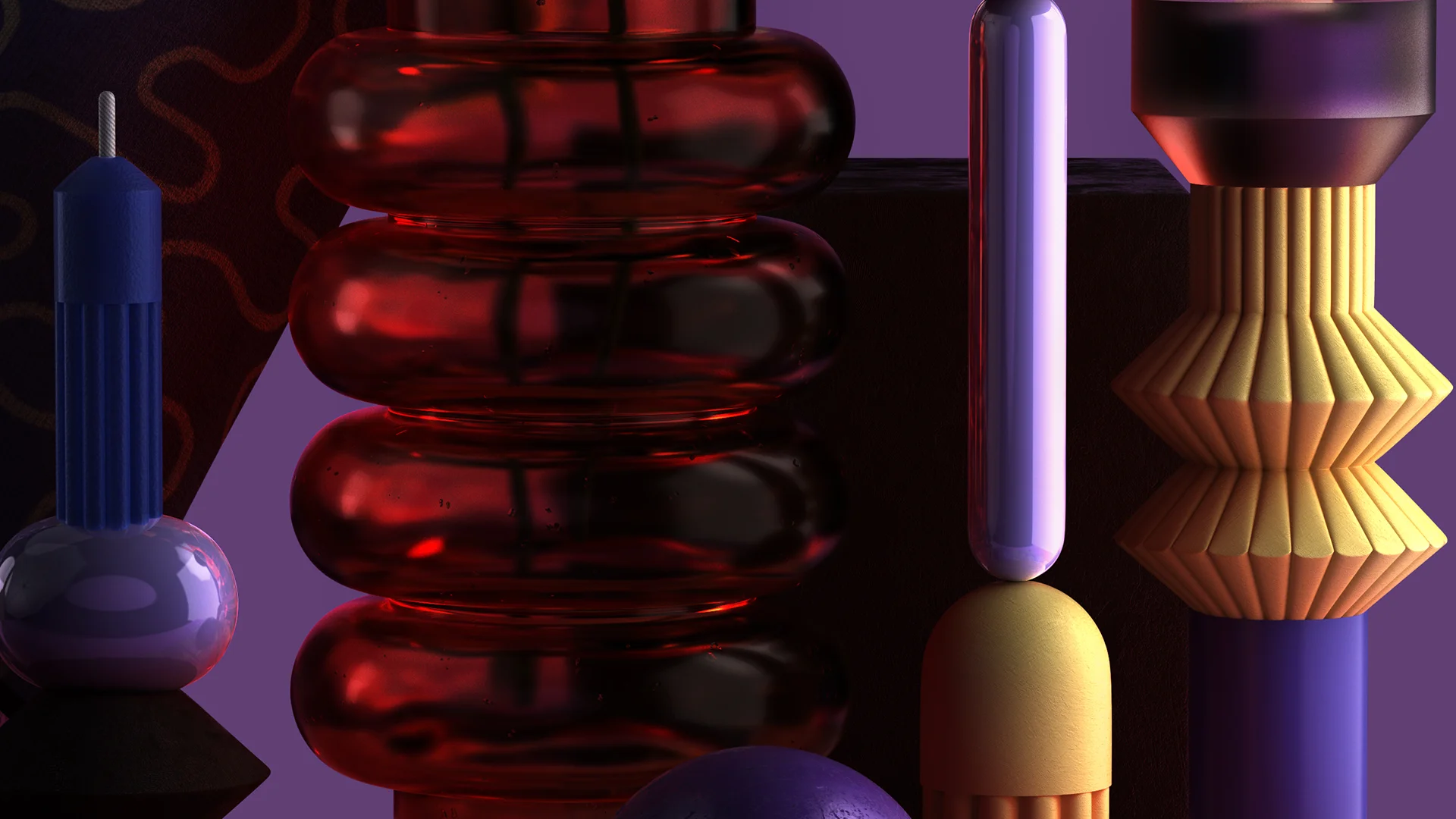 Styling_Stills41 Close-up of a translucent red glass vase surrounded by sculptural lilac candles, geometric candle holders and textured decorative objects.