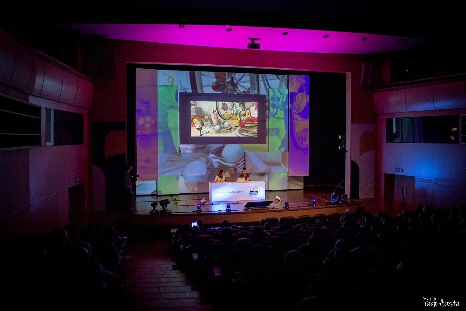 About_Still17B View of the auditorium during Morphine's creative presentation at UYICG in Montevideo.
